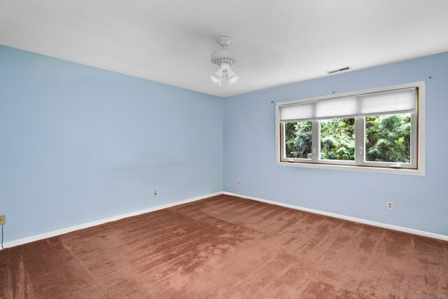 489 Wolcott St Apt 42, Bristol, CT 06010 - empty room with carpet flooring and baseboards