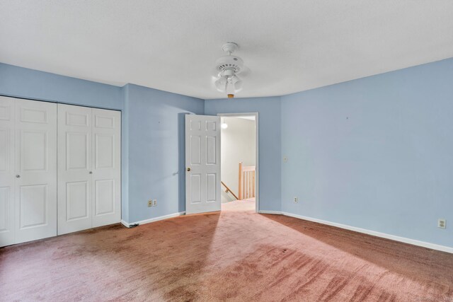 489 Wolcott St Apt 42, Bristol, CT 06010 - unfurnished bedroom featuring carpet floors, baseboards, and a closet