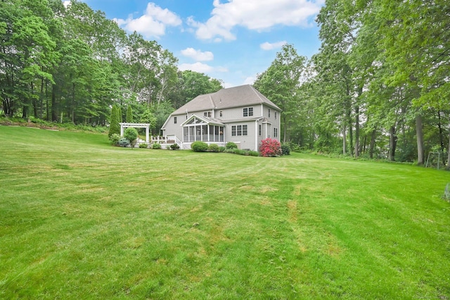 5 Jonathan Dr, Ellington, CT 06029 - rear view of house with a lawn and view of scattered trees
