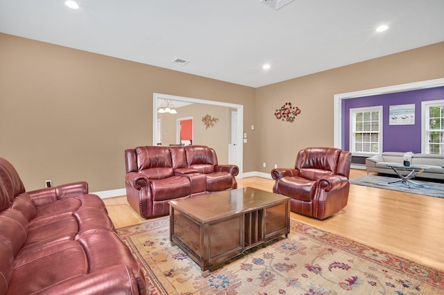 5 Jonathan Dr, Ellington, CT 06029 - living room with baseboards, light wood-style flooring, recessed lighting, and a chandelier