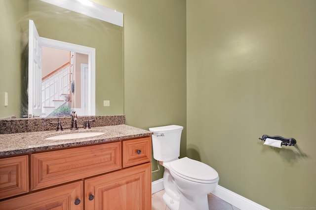 5 Jonathan Dr, Ellington, CT 06029 - half bathroom with toilet, vanity, tile patterned flooring, and baseboards
