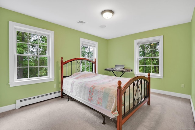 5 Jonathan Dr, Ellington, CT 06029 - bedroom with a baseboard heating unit, carpet floors, and baseboards