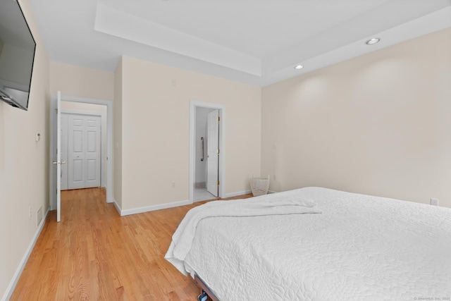 192 Rosewood Ln Unit 192, Berlin, CT 06037 - bedroom with recessed lighting, light wood-style floors, baseboards, and a raised ceiling