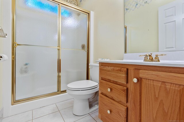 192 Rosewood Ln Unit 192, Berlin, CT 06037 - full bathroom with tile patterned flooring, a shower stall, vanity, and toilet