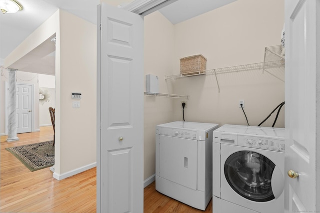 192 Rosewood Ln Unit 192, Berlin, CT 06037 - laundry room with independent washer and dryer, wood finished floors, and baseboards