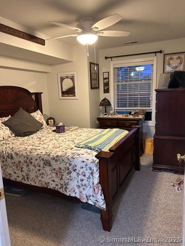 663 W Ave Unit A21, Milford, CT 06461 - carpeted bedroom with ceiling fan