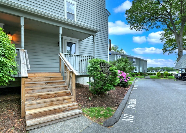 107 Ferry Ct Unit 107, Stratford, CT 06615 - doorway to property featuring a porch and uncovered parking