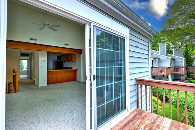 107 Ferry Ct Unit 107, Stratford, CT 06615 - view of wooden balcony with ceiling fan and a wooden deck