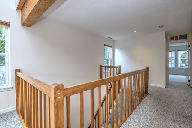 107 Ferry Ct Unit 107, Stratford, CT 06615 - hall featuring an upstairs landing, carpet, baseboards, plenty of natural light, and recessed lighting
