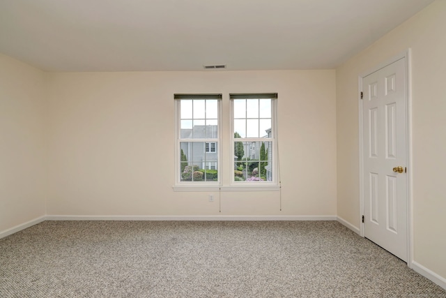 107 Ferry Ct Unit 107, Stratford, CT 06615 - spare room featuring light colored carpet and baseboards