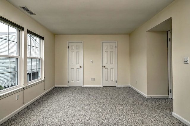 107 Ferry Ct Unit 107, Stratford, CT 06615 - unfurnished bedroom featuring carpet and baseboards