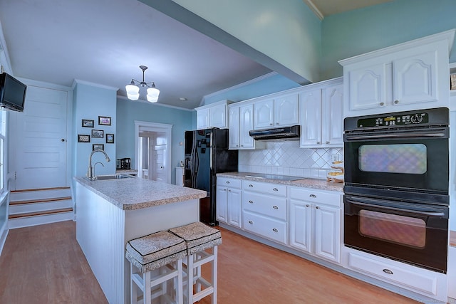 59 Golf St, Newington, CT 06111 - kitchen featuring a sink, black appliances, ornamental molding, and white cabinetry
