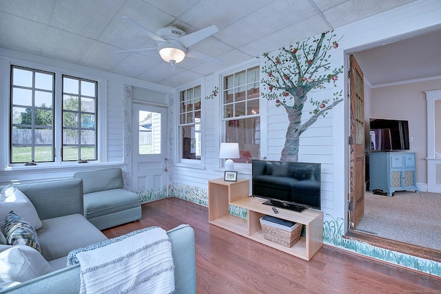 59 Golf St, Newington, CT 06111 - living area featuring wood finished floors, ceiling fan, crown molding, and baseboards