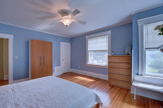 59 Golf St, Newington, CT 06111 - bedroom with multiple windows, light wood-type flooring, baseboards, a ceiling fan, and ornamental molding