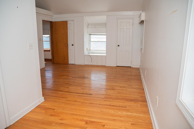 28 Morgan Ter, East Haven, CT 06512 - spare room featuring light wood finished floors, baseboards, and vaulted ceiling