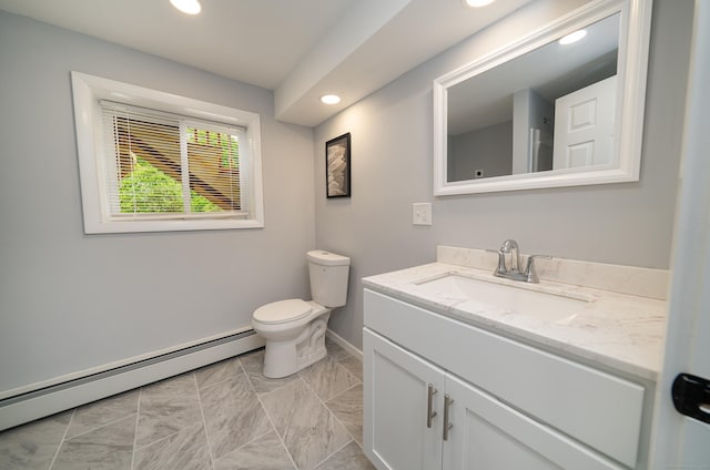 62 Wheeler Hill Dr, Durham, CT 06422 - bathroom with baseboard heating, vanity, baseboards, recessed lighting, and toilet