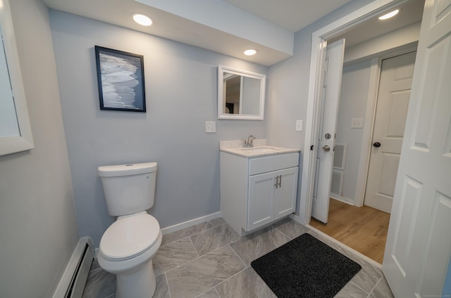 62 Wheeler Hill Dr, Durham, CT 06422 - bathroom with vanity, toilet, recessed lighting, baseboards, and a baseboard heating unit