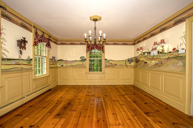 440 Mapleton Ave, Suffield, CT 06078 - unfurnished dining area with baseboard heating, a chandelier, hardwood / wood-style flooring, wainscoting, and a decorative wall