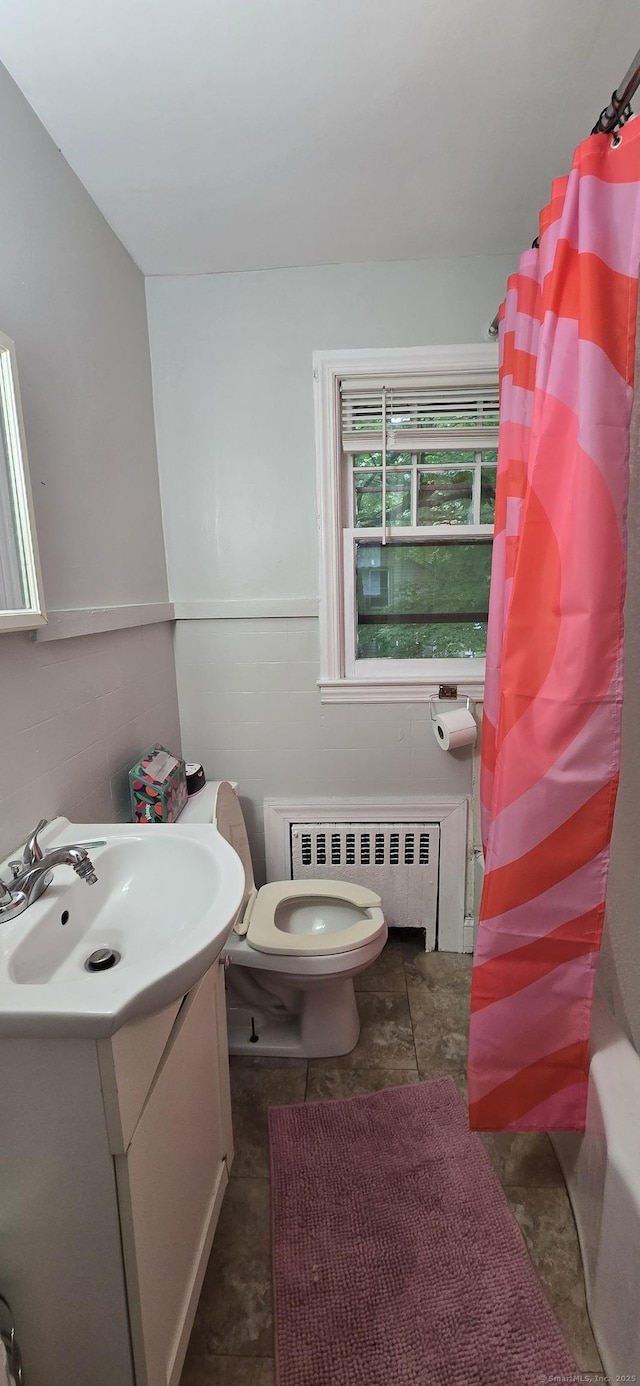 230 Winsted Rd, Torrington, CT 06790 - bathroom featuring radiator, vanity, toilet, and shower / bath combination with curtain