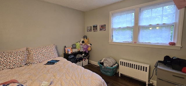 230 Winsted Rd, Torrington, CT 06790 - bedroom featuring radiator, dark wood-style flooring, and baseboards