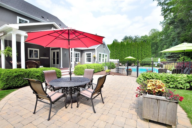 151 Oakridge, Farmington, CT 06085 - view of patio / terrace featuring french doors and outdoor dining area