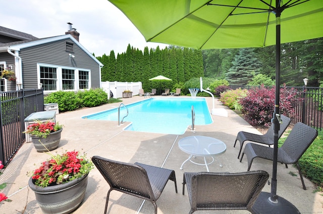 151 Oakridge, Farmington, CT 06085 - view of swimming pool featuring a fenced backyard and a patio area