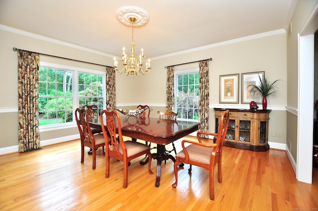 151 Oakridge, Farmington, CT 06085 - dining area with a chandelier, light wood-style floors, and ornamental molding