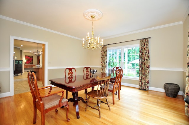 151 Oakridge, Farmington, CT 06085 - dining space featuring a chandelier, crown molding, and light wood-style flooring