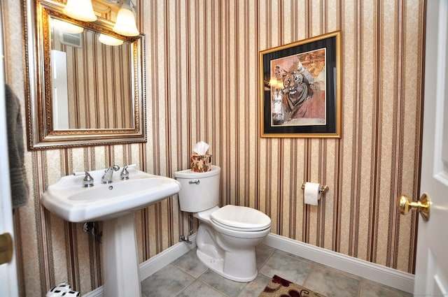 151 Oakridge, Farmington, CT 06085 - bathroom with baseboards and wallpapered walls