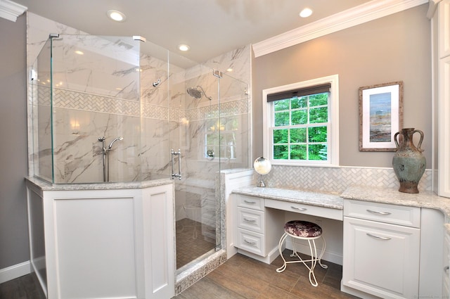 151 Oakridge, Farmington, CT 06085 - full bath featuring crown molding, a marble finish shower, recessed lighting, wood finished floors, and backsplash
