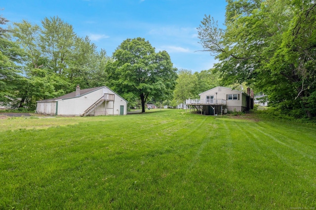 1190 Peck Ln, Cheshire, CT 06410 - view of grassy yard featuring stairs and a deck