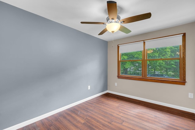 1190 Peck Ln, Cheshire, CT 06410 - empty room featuring baseboards, dark wood-style floors, and a ceiling fan