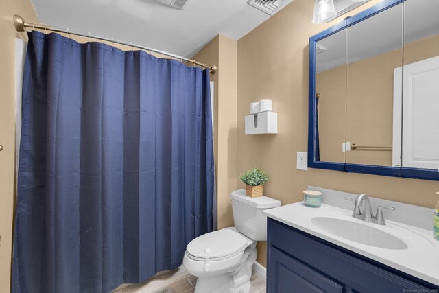 1190 Peck Ln, Cheshire, CT 06410 - full bathroom featuring toilet, vanity, and a shower with curtain