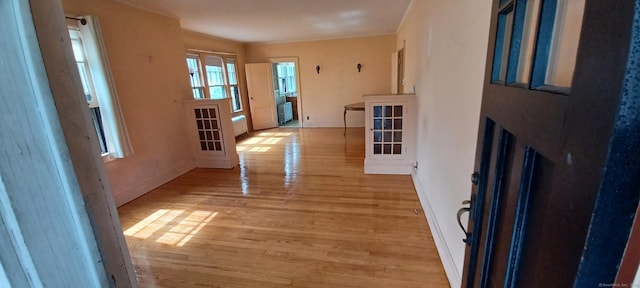 25 Richard Rd, East Hartford, CT 06108 - hallway with light wood-type flooring and baseboards