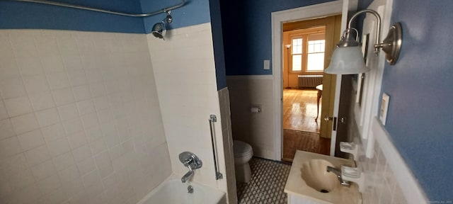 25 Richard Rd, East Hartford, CT 06108 - full bathroom with radiator heating unit, shower / bath combination, and wainscoting