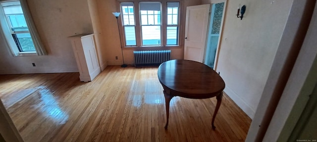 25 Richard Rd, East Hartford, CT 06108 - hall featuring radiator and wood finished floors