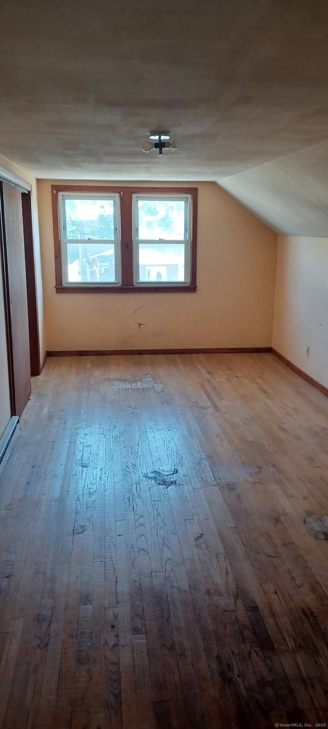 25 Richard Rd, East Hartford, CT 06108 - bonus room featuring lofted ceiling and wood-type flooring