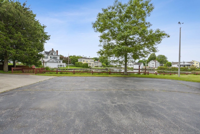 40 Holmes St, Stonington, CT 06355 - view of parking featuring a residential view