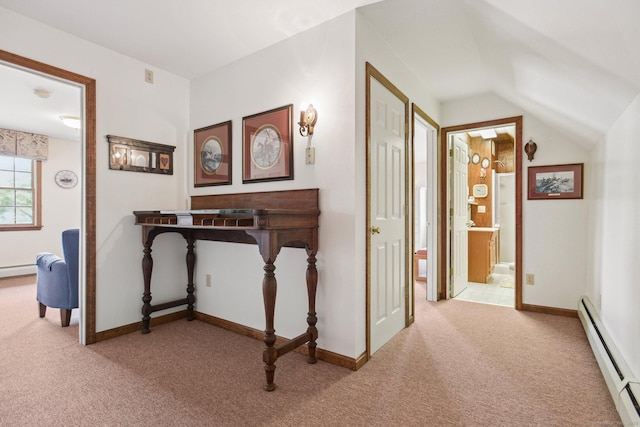 40 Holmes St, Stonington, CT 06355 - hall featuring light colored carpet, a baseboard heating unit, vaulted ceiling, baseboards, and a baseboard radiator