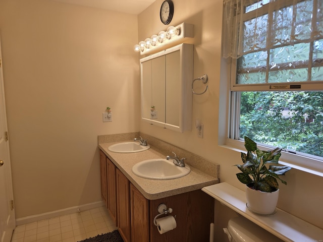 141 Grove St, Shelton, CT 06484 - bathroom featuring double vanity and tile patterned flooring