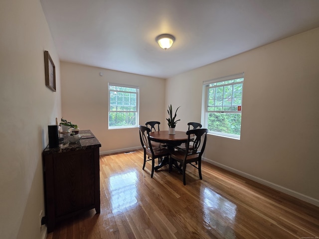 141 Grove St, Shelton, CT 06484 - dining room featuring wood finished floors and baseboards