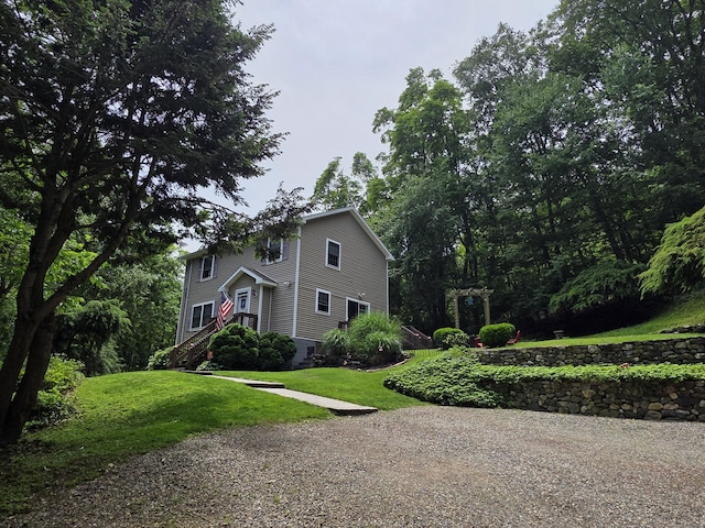 141 Grove St, Shelton, CT 06484 - view of side of home with a lawn