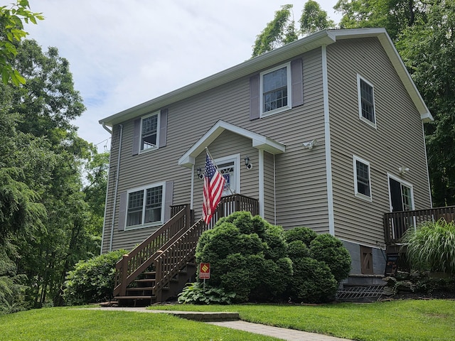 141 Grove St, Shelton, CT 06484 - view of front of house featuring a front yard and a wooden deck
