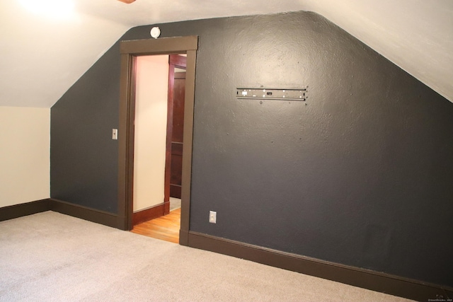 404 Center St, West Haven, CT 06516 - bonus room with carpet floors, vaulted ceiling, and baseboards