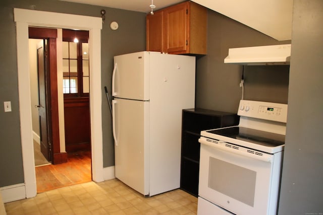 404 Center St, West Haven, CT 06516 - kitchen featuring white appliances, extractor fan, and brown cabinets
