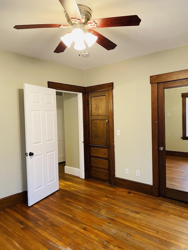 404 Center St, West Haven, CT 06516 - unfurnished bedroom with hardwood / wood-style flooring, baseboards, and ceiling fan