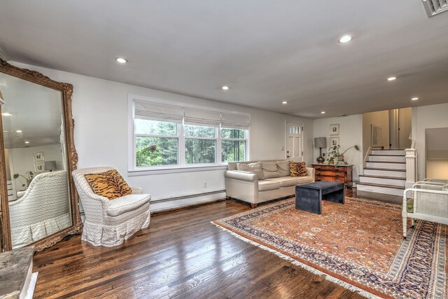 1690 Hartford Tpke, North Haven, CT 06473 - living area with baseboard heating, wood finished floors, stairs, and recessed lighting