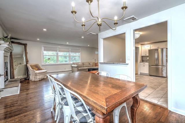 1690 Hartford Tpke, North Haven, CT 06473 - dining space with baseboard heating, a chandelier, recessed lighting, light wood finished floors, and baseboards
