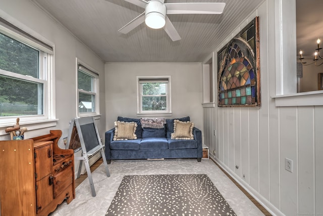 1690 Hartford Tpke, North Haven, CT 06473 - living area featuring a ceiling fan and ornamental molding