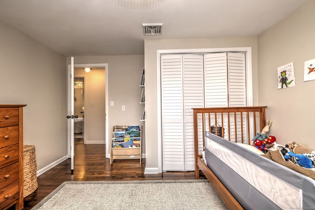1690 Hartford Tpke, North Haven, CT 06473 - bedroom with wood finished floors, a closet, and baseboards